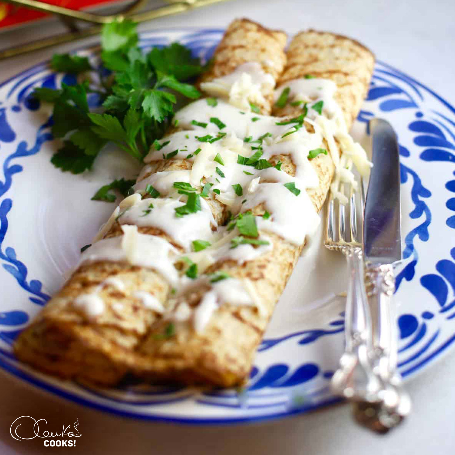 Crepes stuffed with chicken and bechamel