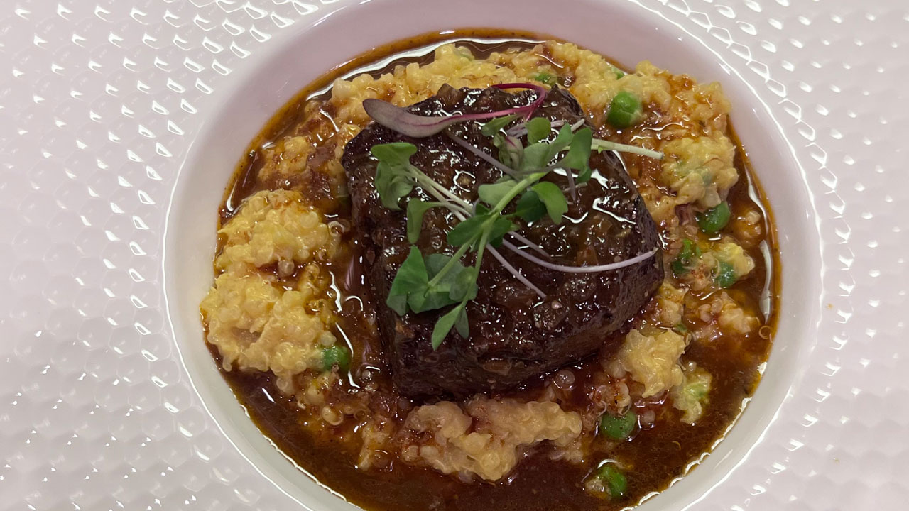 Beef adobo over Quinotto with Huancaina